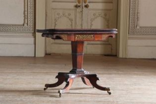A Regency rosewood and brass-inlaid pedestal card table,