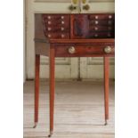 ☘ A small mahogany desk with a raised back,