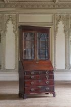 ☘ A George III mahogany bureau bookcase,