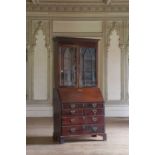 ☘ A George III mahogany bureau bookcase,