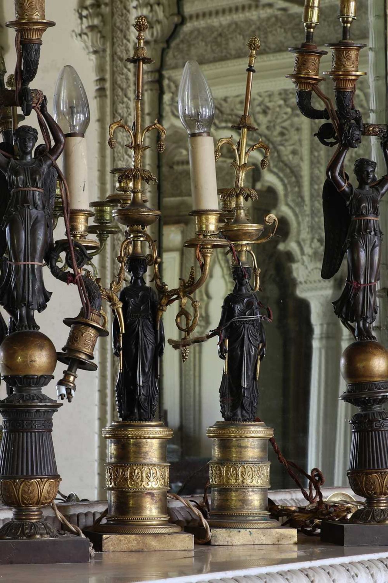 ☘ A pair of Regency gilt and patinated bronze candelabra,