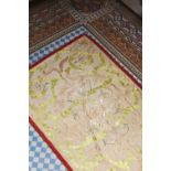 ☘ A rectangular embroidered textile panel,