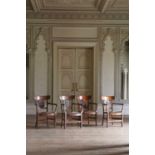 ☘ A set of four Biedermeier walnut bar-back armchairs,