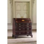 ☘ A mahogany and satinwood bureau,