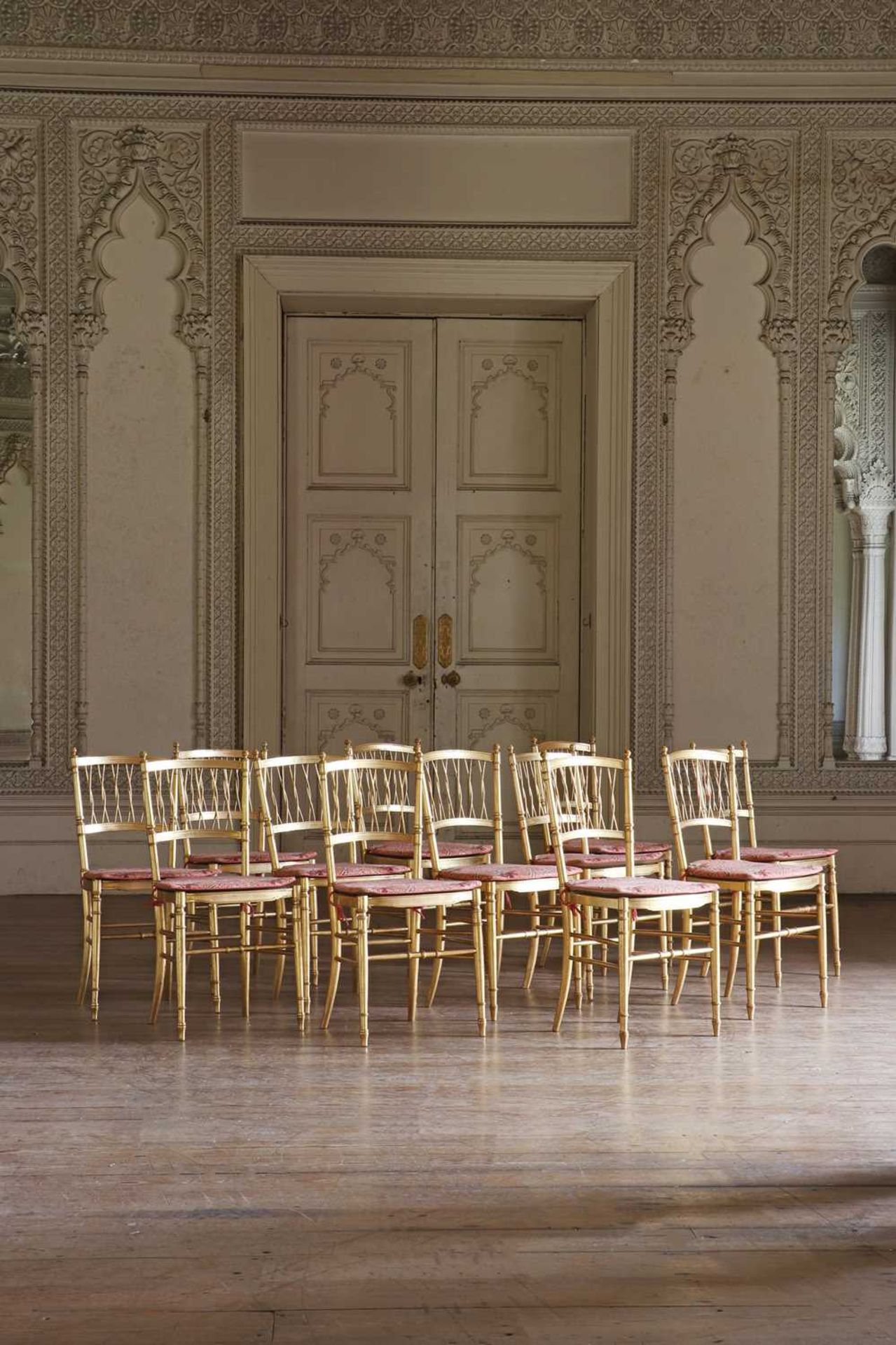 ☘ A set of twelve giltwood ballroom chairs,
