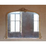 ☘ A large gilt gesso overmantel mirror,
