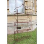 A garden room modern ironwork plant stand,