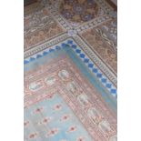 ☘ A large blue Amritsar carpet,