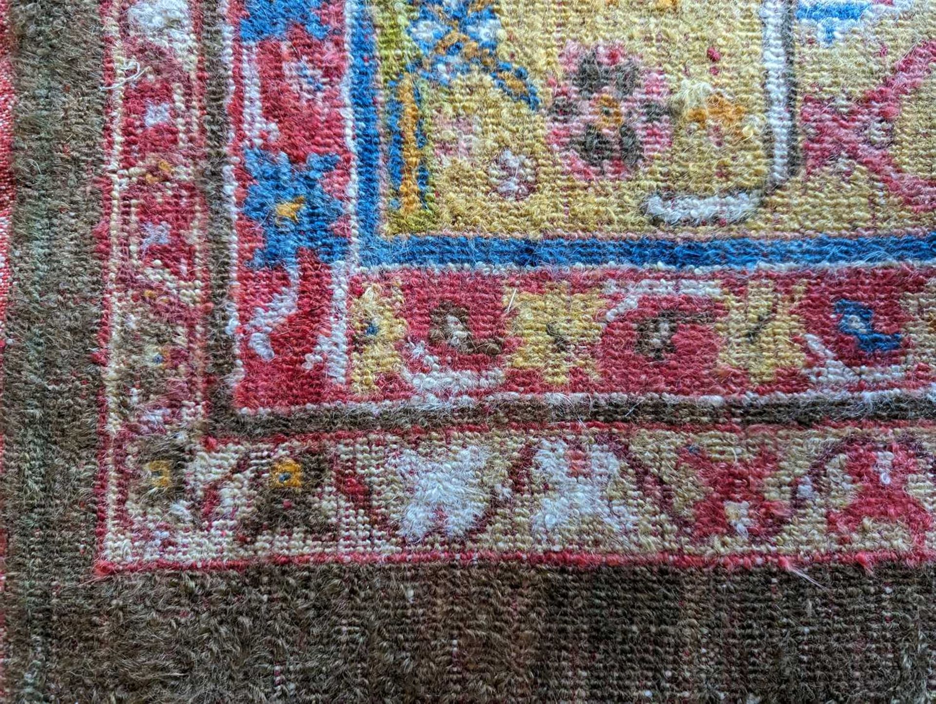 ☘ A Kurdish wool carpet, - Image 35 of 48