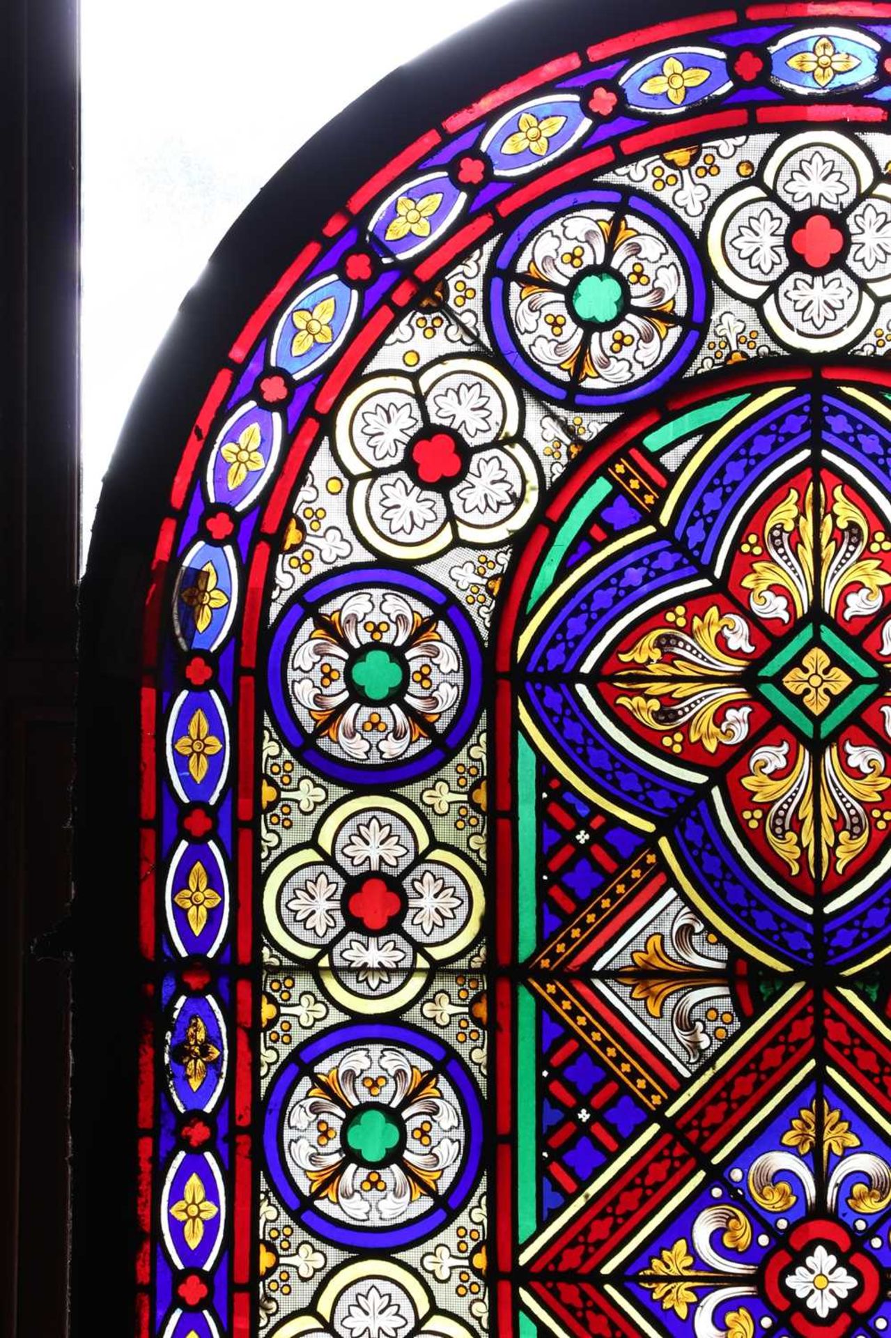 ☘ A Victorian Gothic Revival stained-glass window,