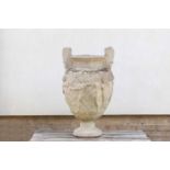 A composite stone urn,