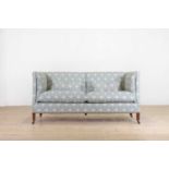 A two-seater 'Castellane' sofa by Howard & Sons,