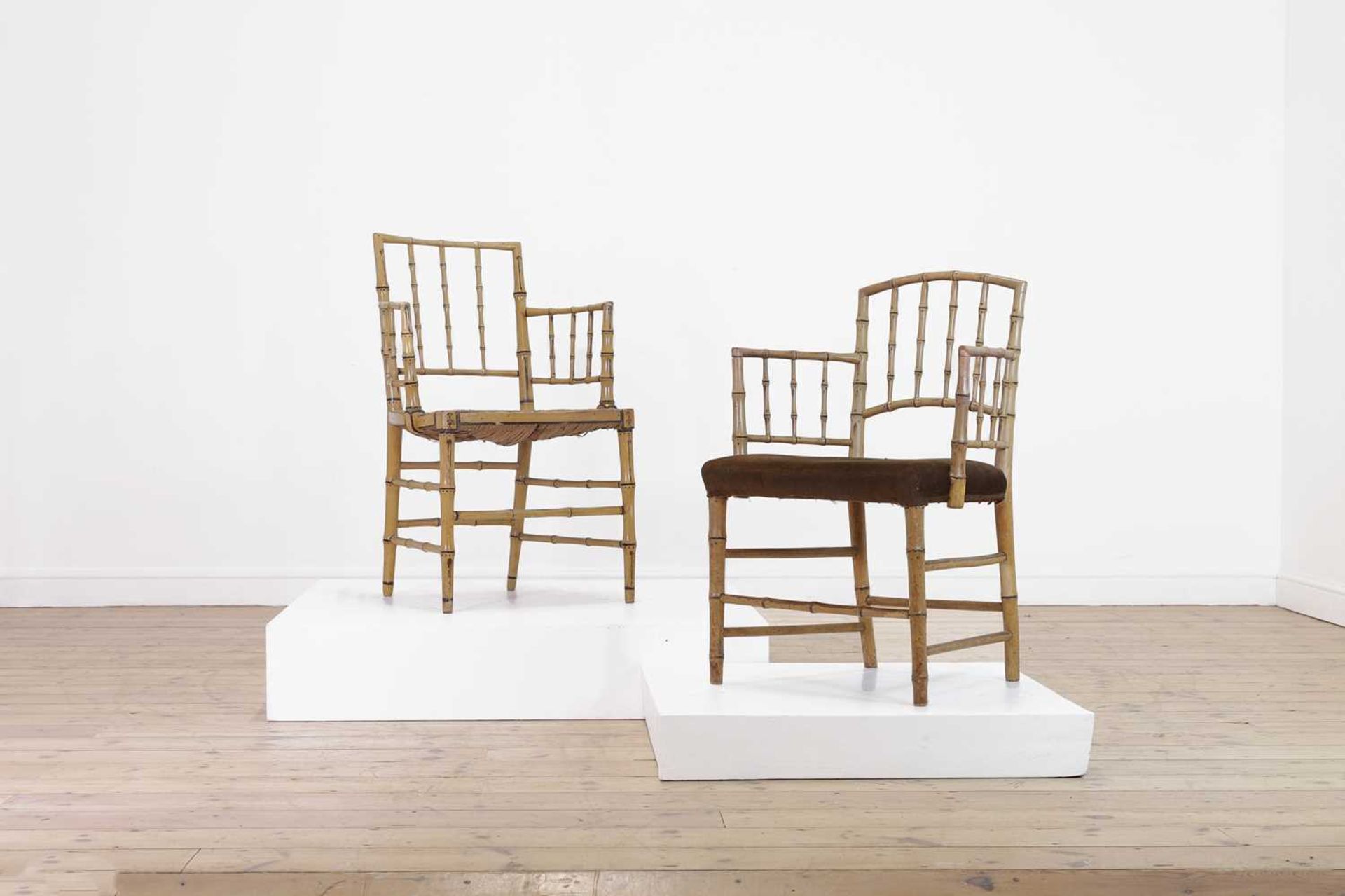 Two Regency faux bamboo painted open armchairs,