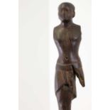 An ancient Egyptian carved wooden figure in the Middle Kingdom-style,