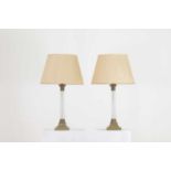 A pair of gilt-metal and moulded glass column lamps,