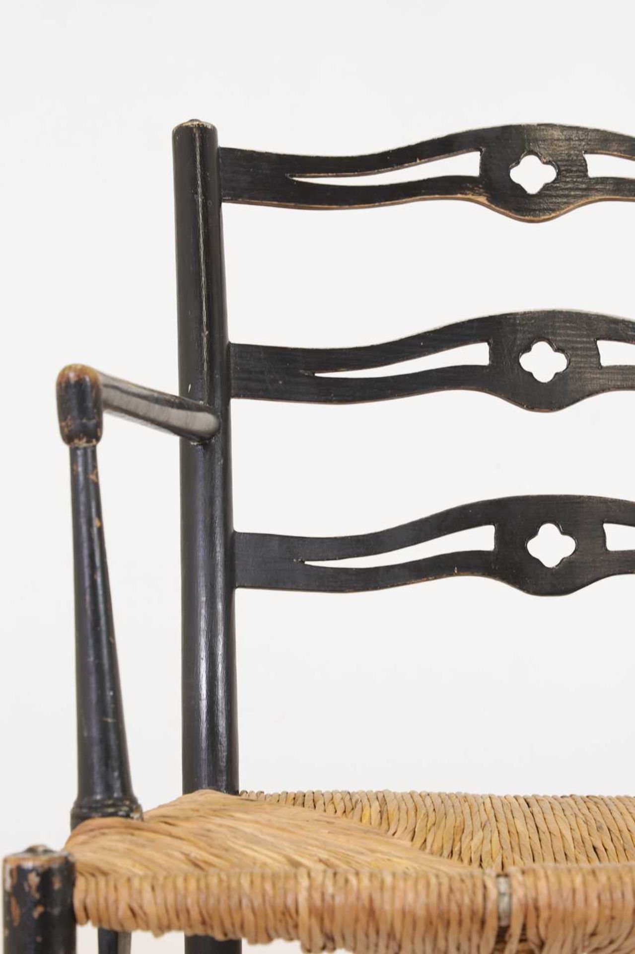 An ebonised wooden elbow chair, - Bild 2 aus 20