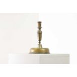 A brass candlestick,