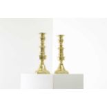 A pair of Victorian brass candlesticks,