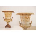 A pair of painted cast iron campana urns