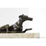 A small bronze figure of a greyhound,