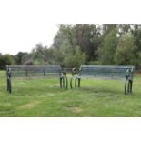 A pair of cast metal benches,