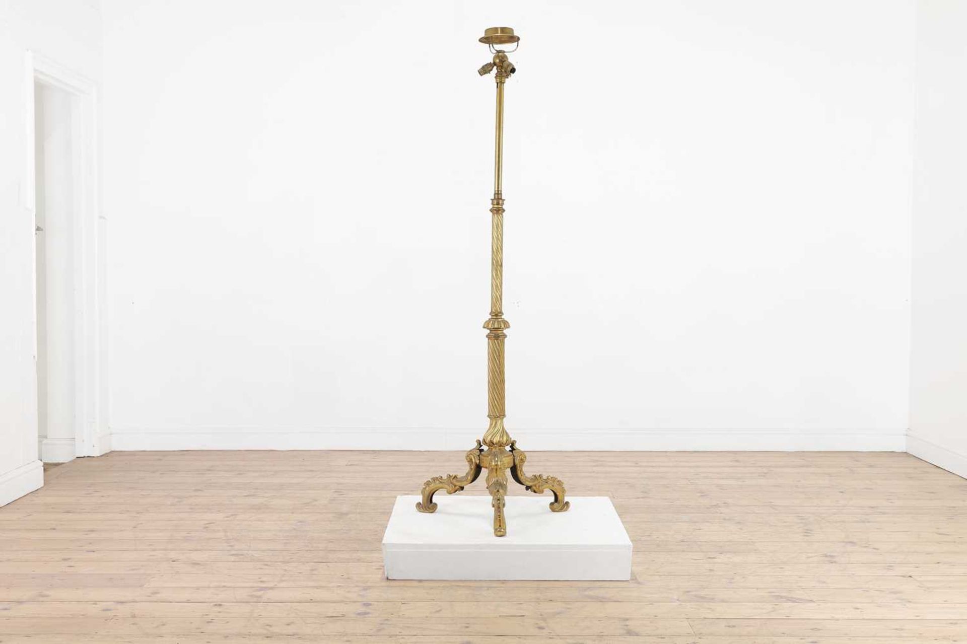 A telescopic gilt-brass floor lamp,