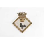 A gilt and painted bronze ship's badge,