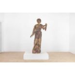 A carved and painted pine advertising figure,