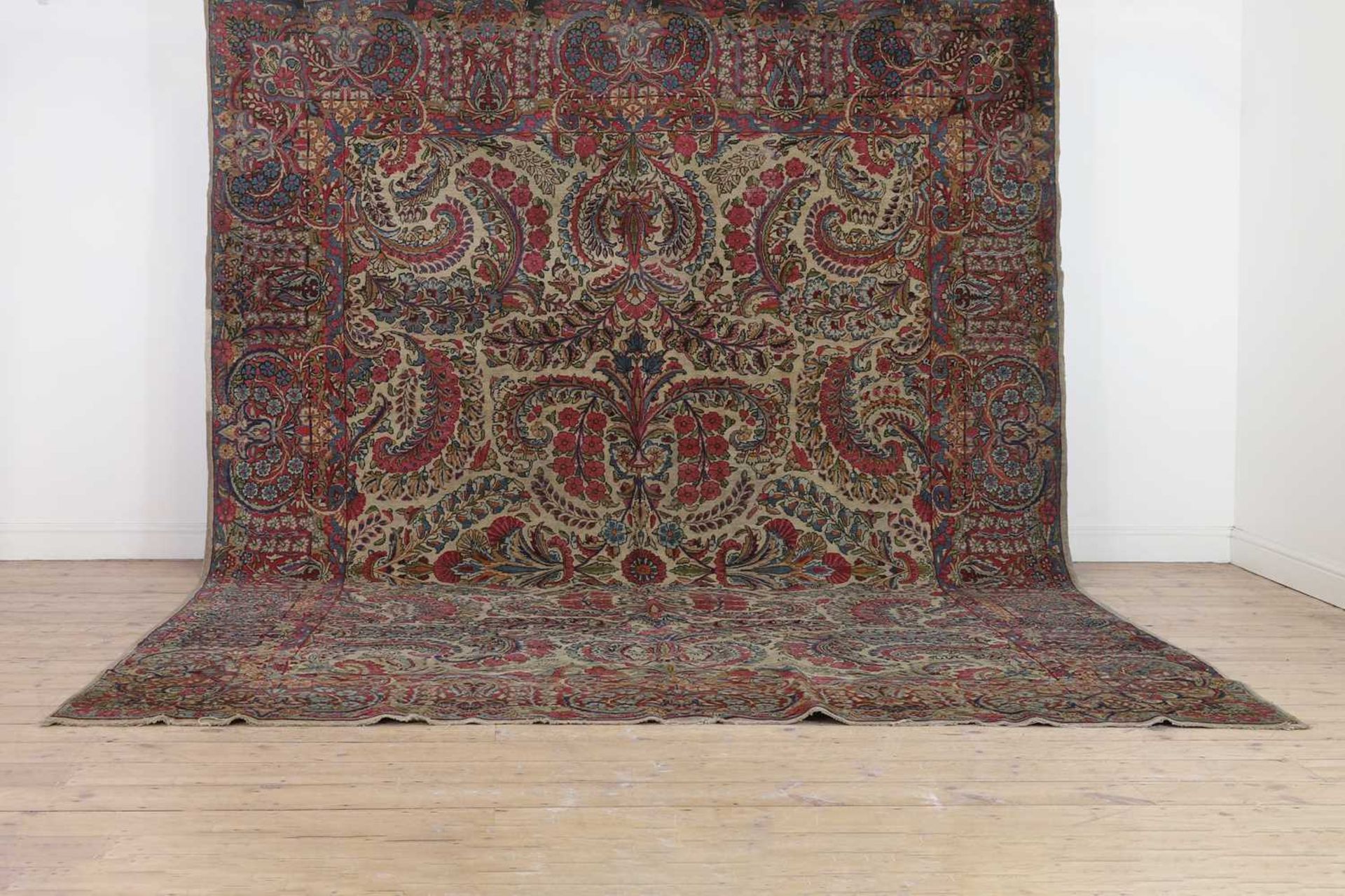 A Kirman wool carpet,