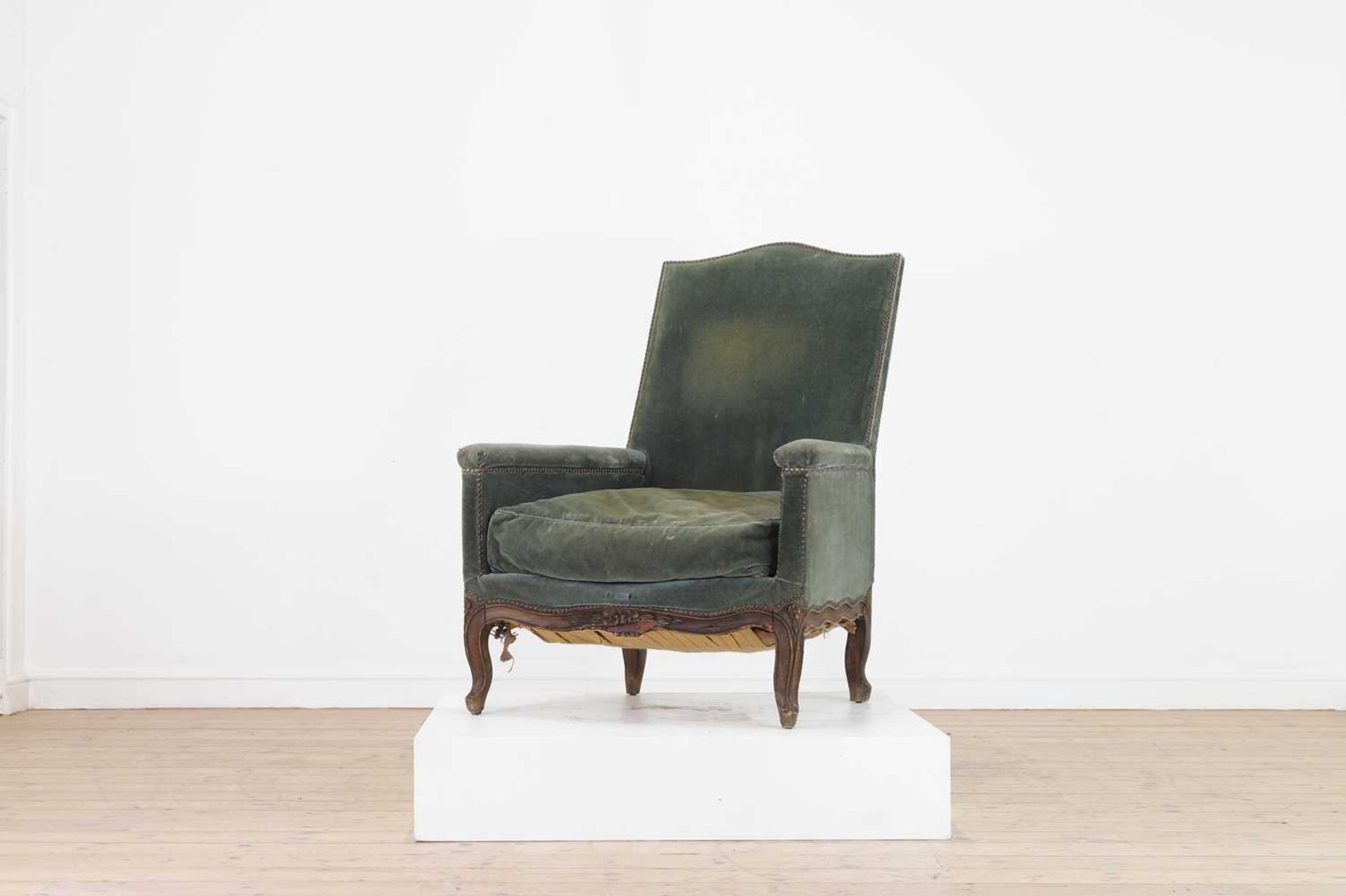 A large beech armchair in the Louis XV taste,