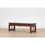 A red-lacquered low table,