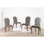 A set of four George I walnut side chairs,