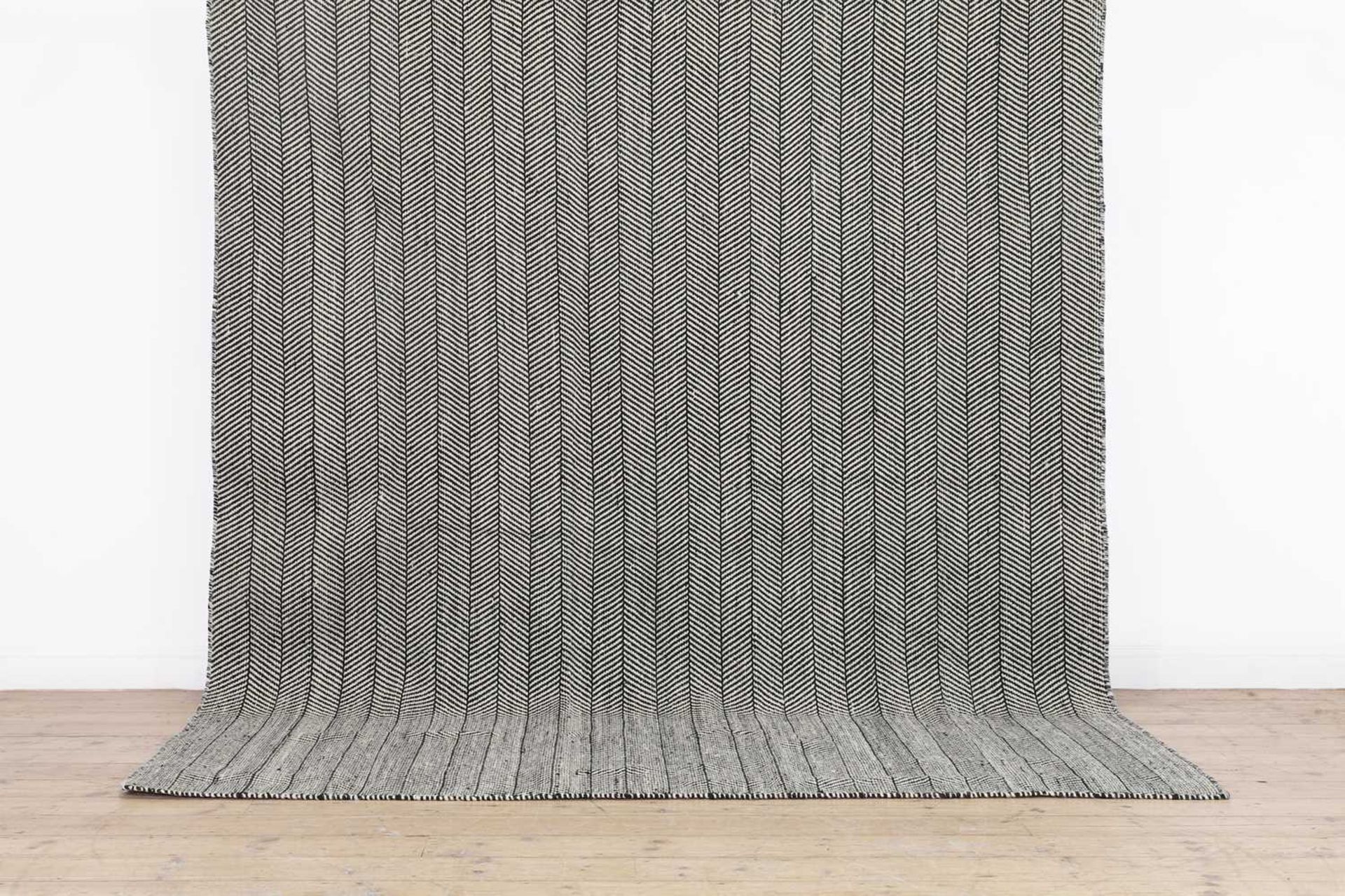 An herringbone wool carpet,