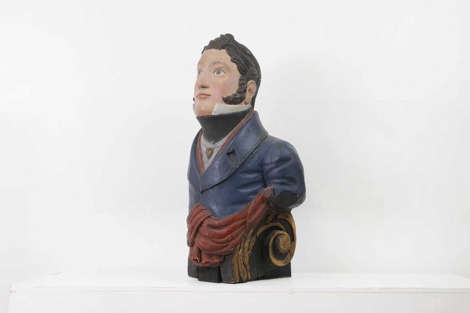 A carved and painted figurehead,