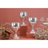 Three George IV silver presentation trophies,