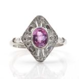 A pink sapphire and diamond lozenge shaped cluster ring,