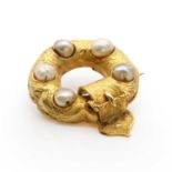 A Victorian gold and blister pearl garter brooch,