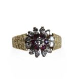 An 18ct gold ruby and diamond floral cluster ring,