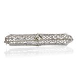 A white gold diamond set bar brooch,