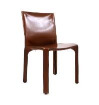 A leather Cab 412 chair,