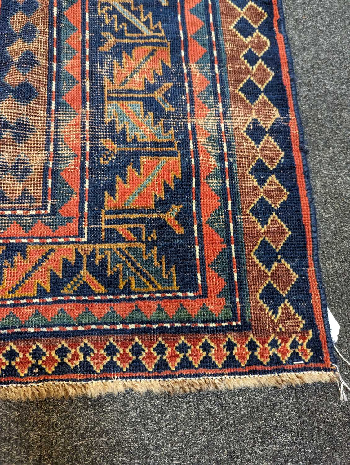 A Kazak wool rug - Image 23 of 49