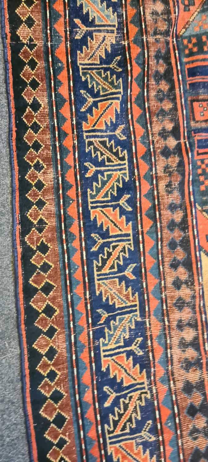 A Kazak wool rug - Image 12 of 49