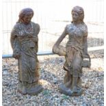 A pair of iron garden figures