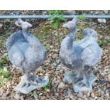 A pair of lead garden figures