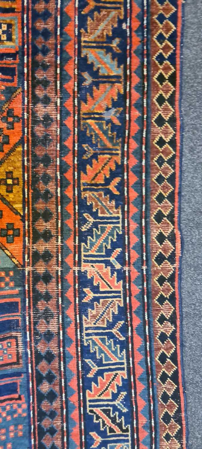 A Kazak wool rug - Image 18 of 49