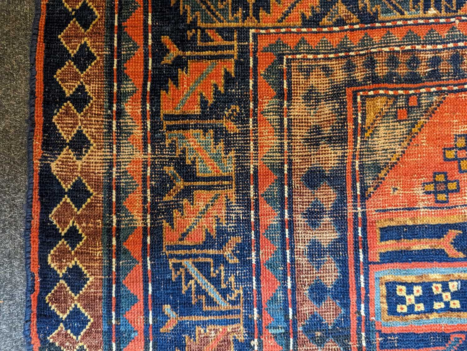 A Kazak wool rug - Image 32 of 49