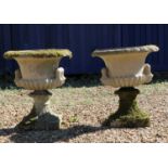 A group of four composite stone Campana urns,