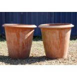 A pair of large Italian terracotta urns