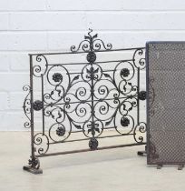 Three wrought iron firescreens,