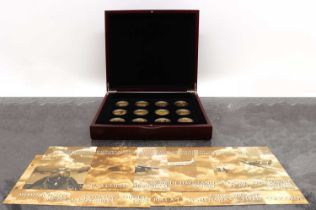 A set of twelve gold plated 999 fine silver proof crown size coins,